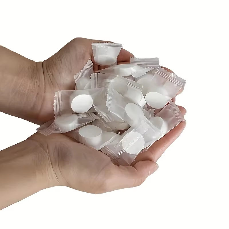 Compressed Towels 50 Pack - Portable Disposable Travel Face & Hand Towels
