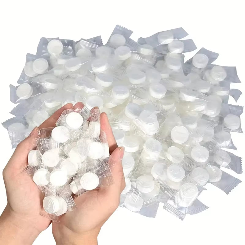 Compressed Towels 50 Pack - Portable Disposable Travel Face & Hand Towels